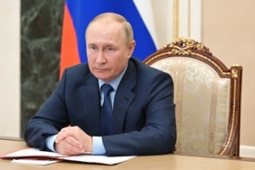 Russian President Vladimir Putin chairs a meeting with permanent members of the Russian Security Council